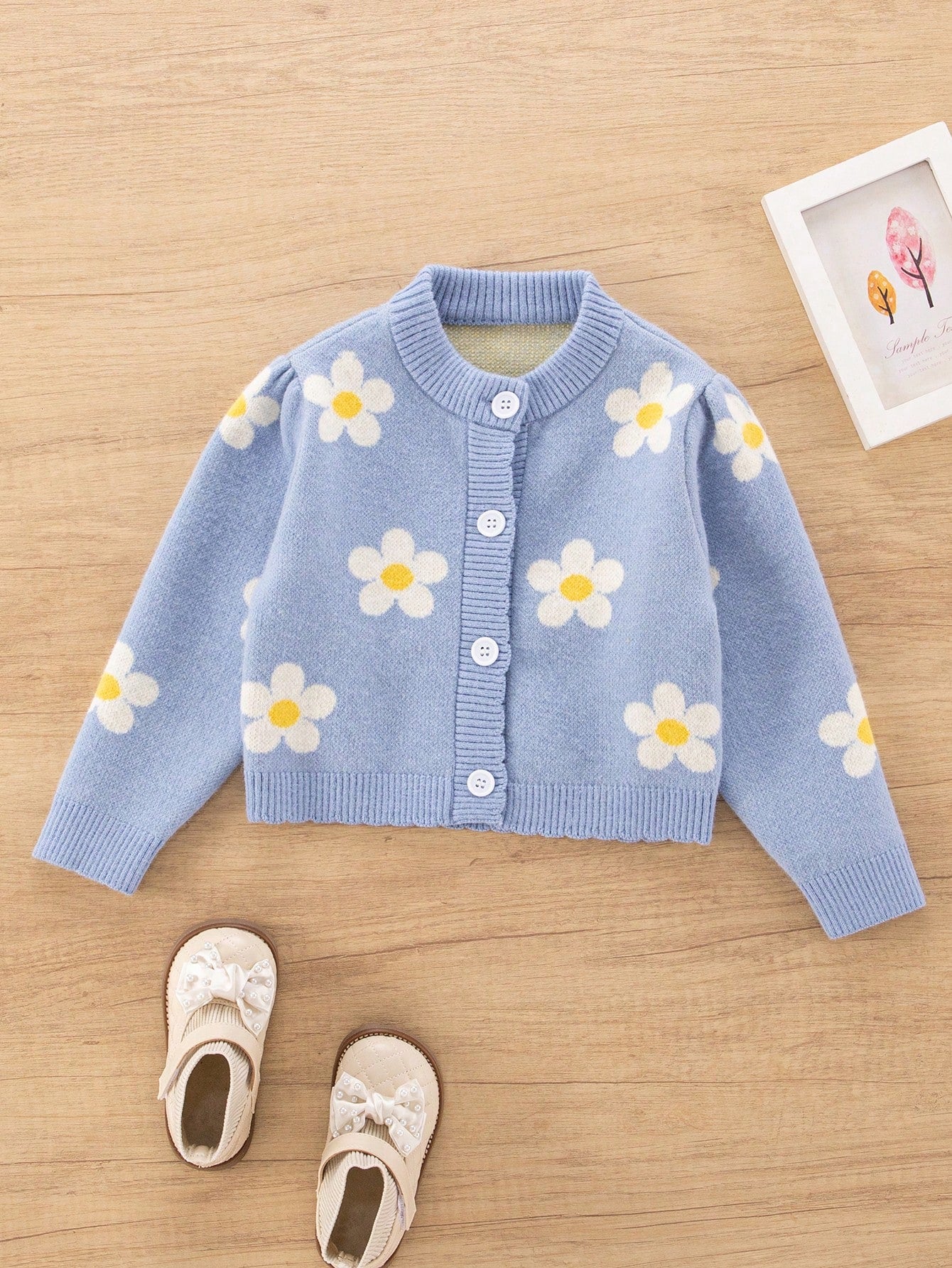 Soft Blue Floral Jacquard Girls' (Toddler) Cardigan With A Fresh And Lovely Design. The Light Blue Tone Is Clean And Gentle, Complementing The Floral Jacquard Pattern To Showcase The Pure And Innocent Elegant Of Little Girls. The Classic And Fashionable C