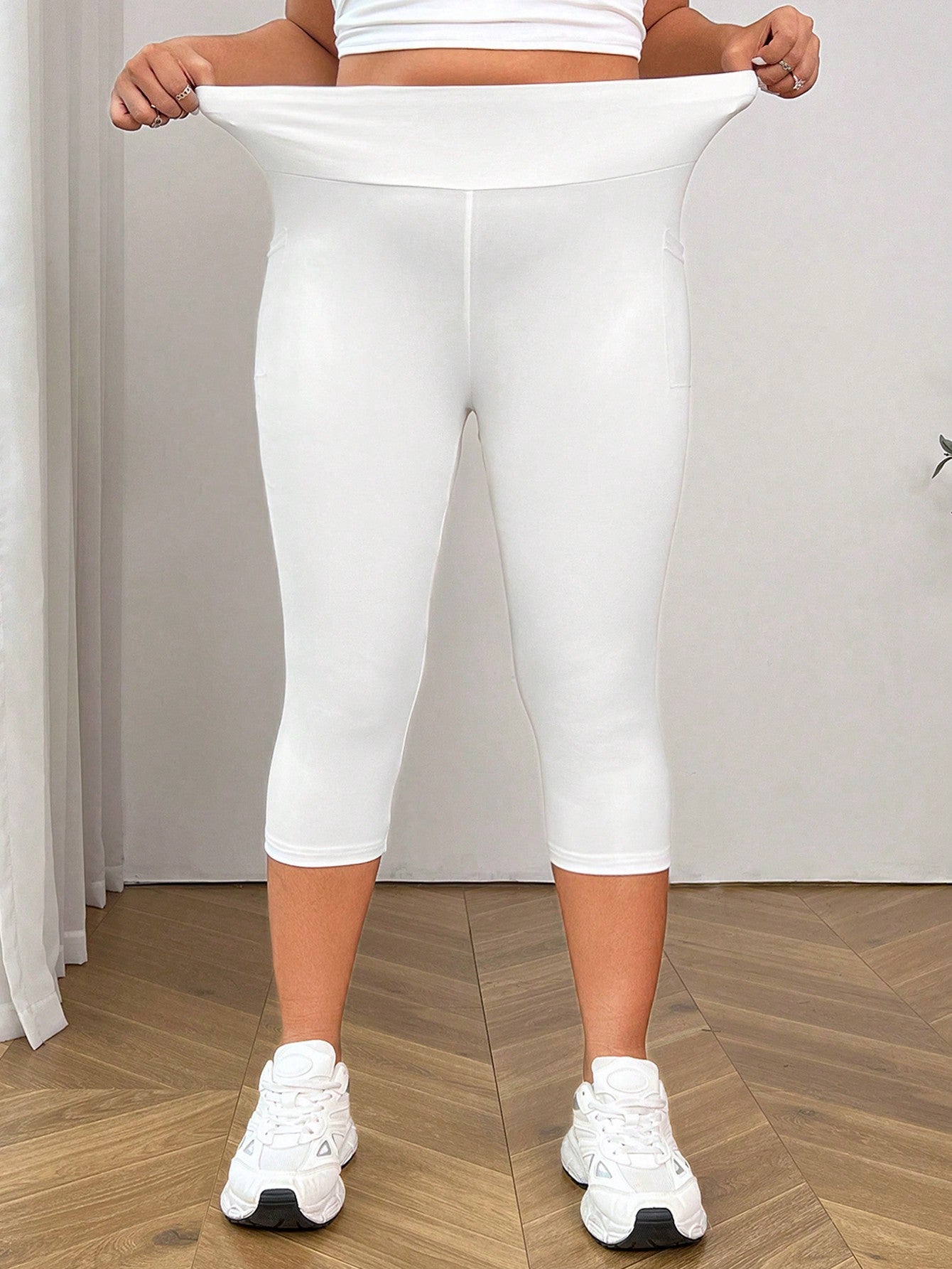 Plus Size Casual Solid Color High Waisted Side Pocket Seven-Point Leggings