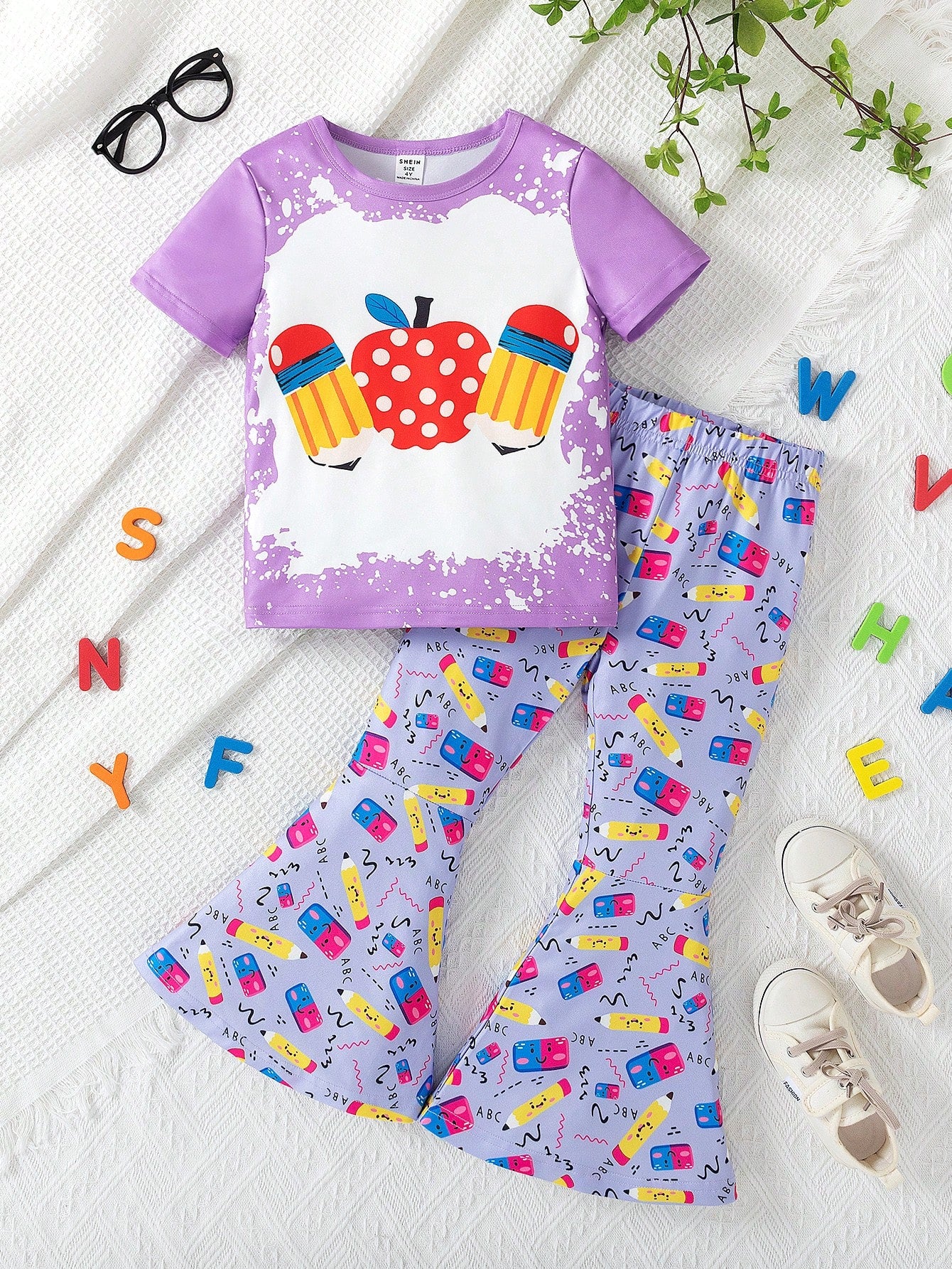 Young Girl Cartoon Graphic Tee & Flare Leg Pants