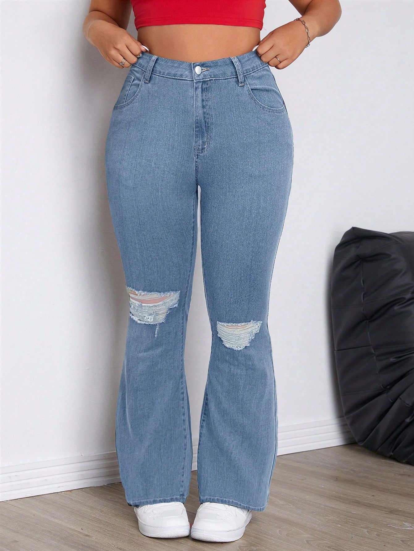 Plus Size Solid Color Skinny Flared Jeans With Distressed Details