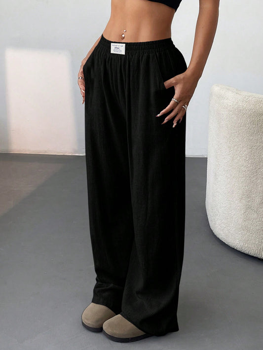 Women's Black Woven Casual Wide Leg Letter Printed Elastic Waist Palazzo Pants