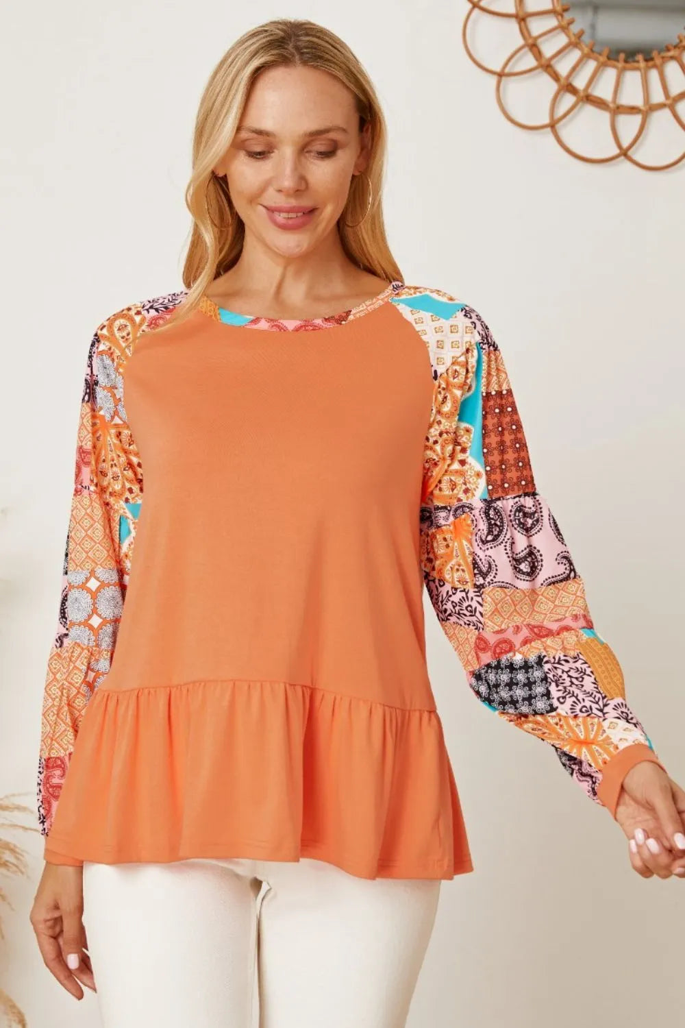 Printed Round Neck Peplum Blouse